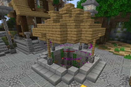A Minecraft screenshot of a square stone well with a wooden roof in a cobblestone town square. Floating holographic text above the open pit reads "Jump into the well below to begin your adventure IF YOU DARE!!!" surrounded by purple magic particles.